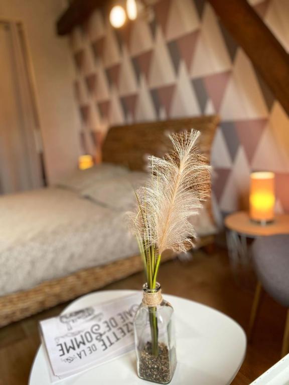Postel nebo postele na pokoji v ubytování Chambres dhotes a la ferme