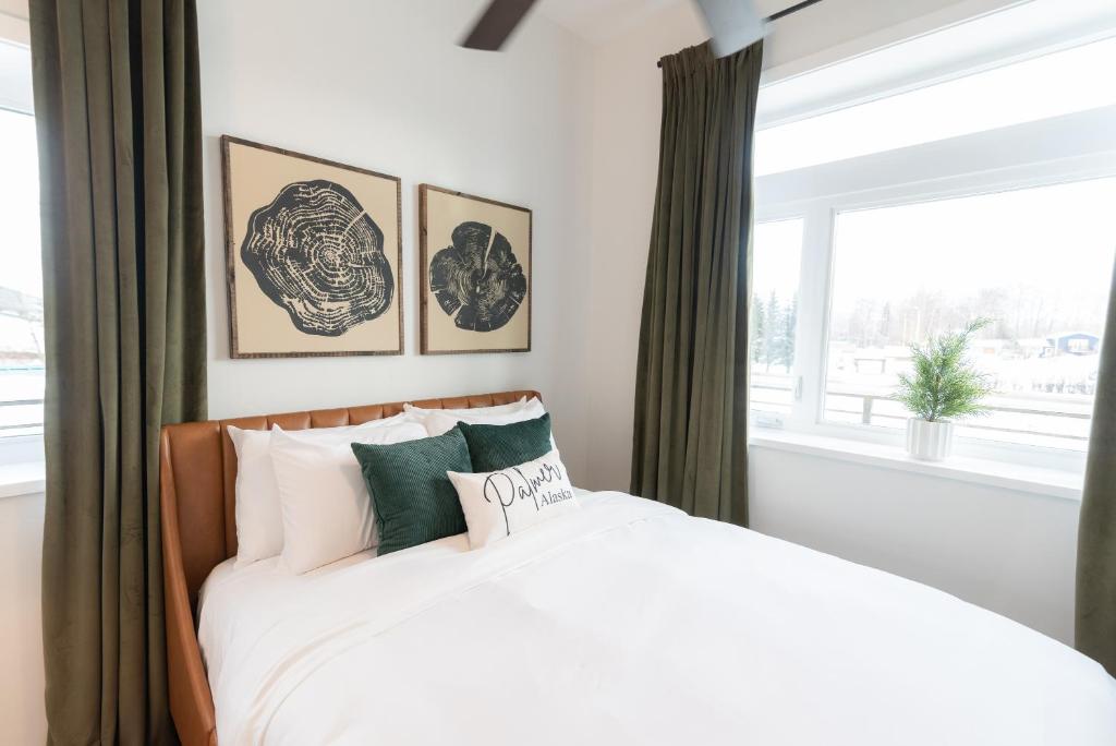 Postel nebo postele na pokoji v ubytování Colony Suites