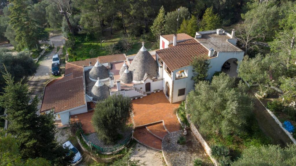an aerial view of a house with a roof at Suggestivo Trullo in valle d'itria in Ceglie Messapica