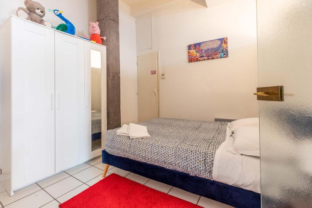 Posteľ alebo postele v izbe v ubytovaní Appartement spacieux Luna Park centre