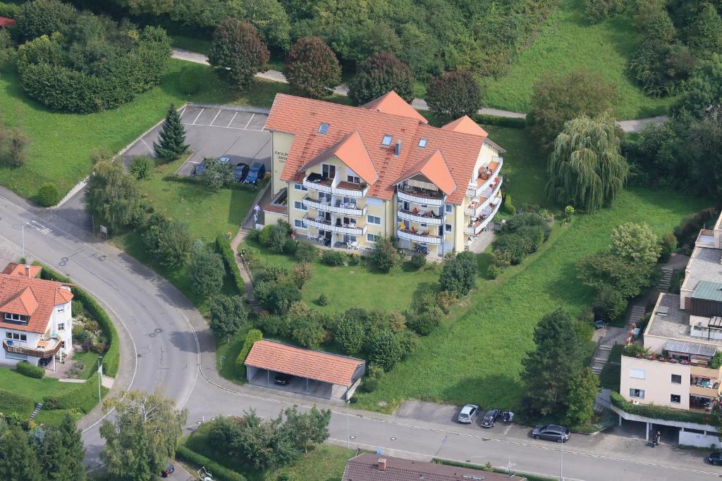 an aerial view of a large house with a street at Ferienhaus Rheintalblick in Bad Bellingen
