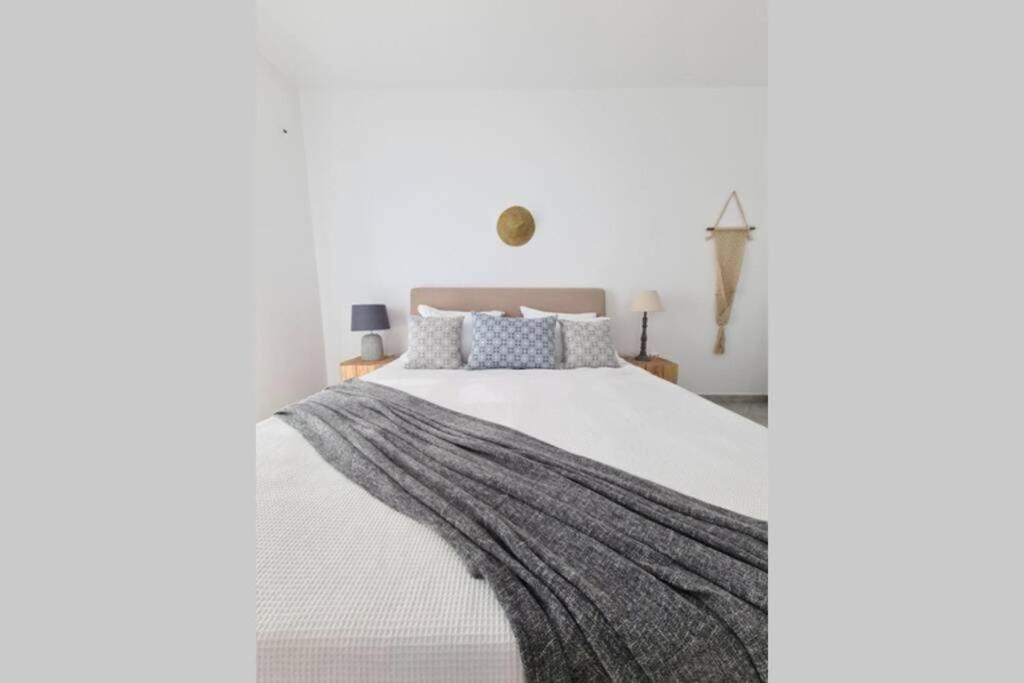 Postel nebo postele na pokoji v ubytování Kaiya Villas