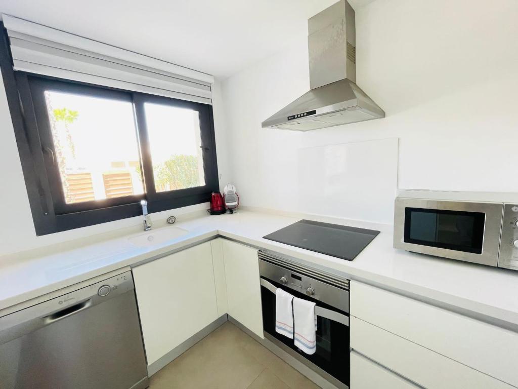 Kuchyň nebo kuchyňský kout v ubytování Villa BALI 3032