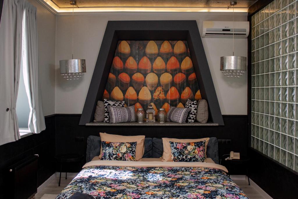 Postel nebo postele na pokoji v ubytování MaNNa Boutique Hotel