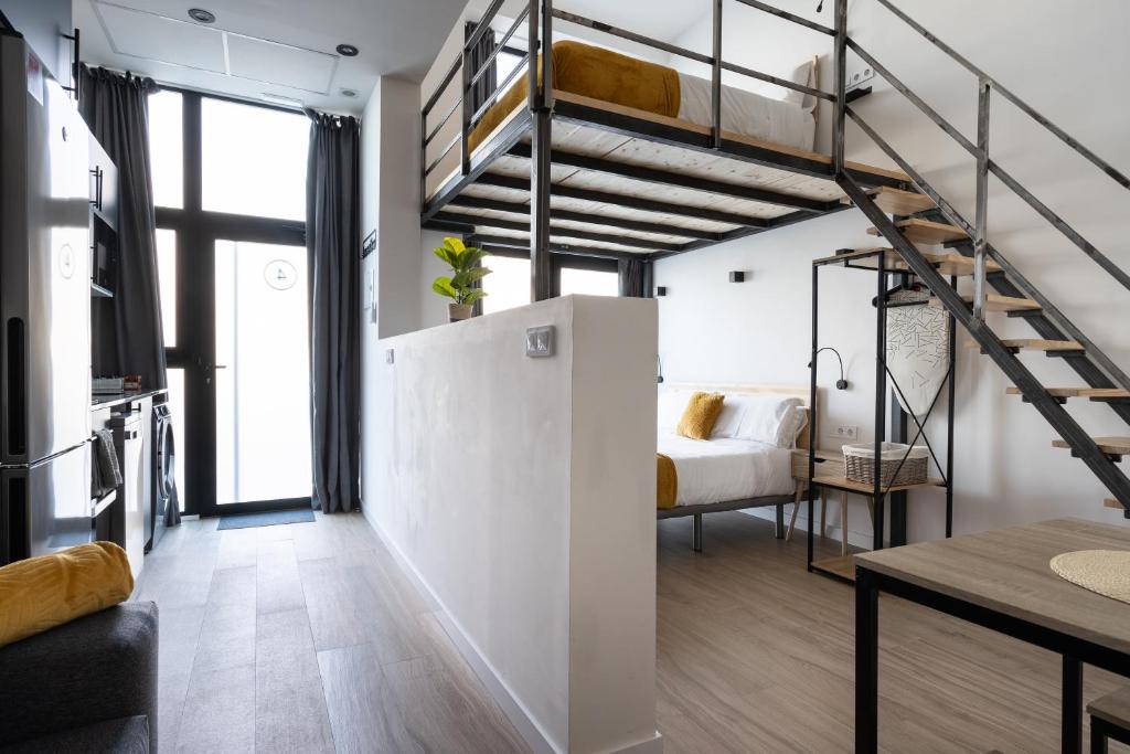 Posteľ alebo postele v izbe v ubytovaní Vip Apartments Valencia