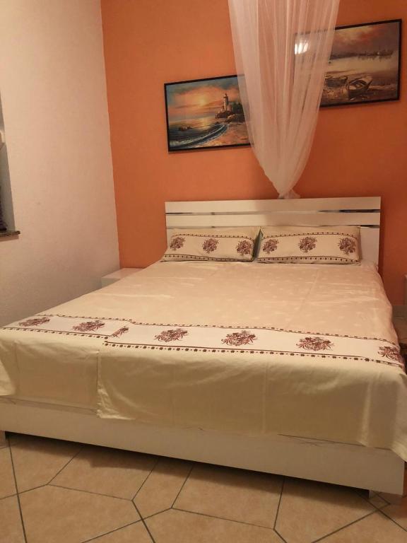 Postel nebo postele na pokoji v ubytování Casa Mare Rtina Garten Zwei Baeder EG