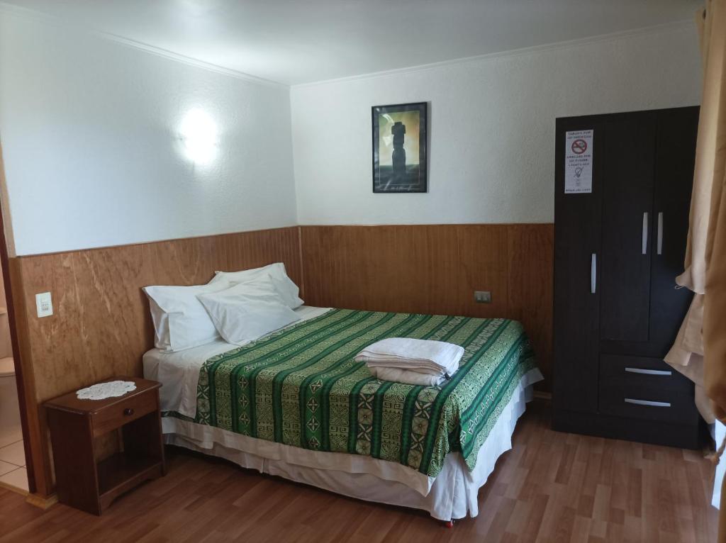 Letto o letti in una camera di Cabañas MANA NUI INN
