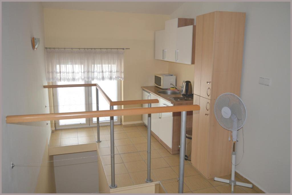 Kuchyň nebo kuchyňský kout v ubytování Apartmány Tiva