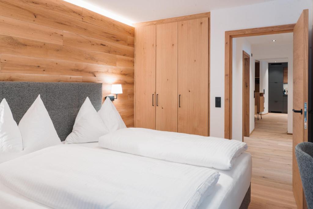 Postel nebo postele na pokoji v ubytování Salzkammergut Lodge