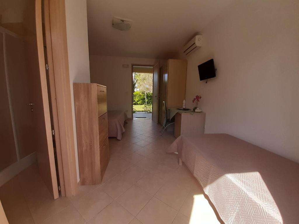 TV a/nebo společenská místnost v ubytování B&B Borgo Minerva