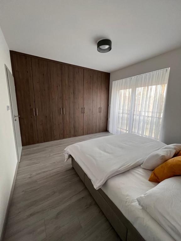 Postel nebo postele na pokoji v ubytování Rivapark