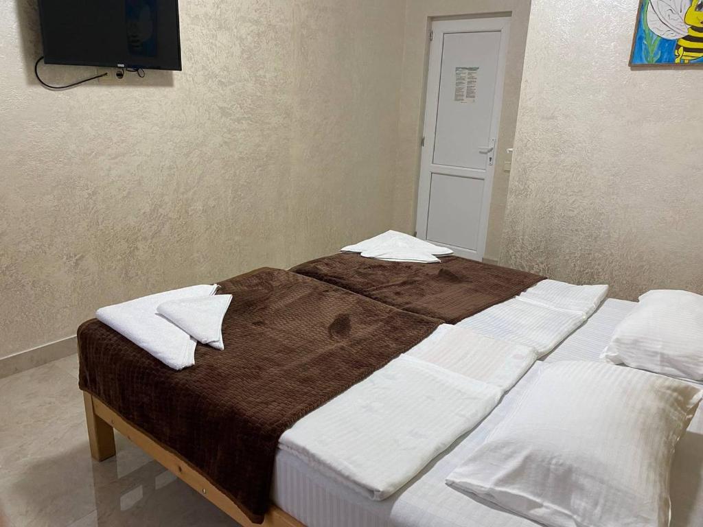 Llit o llits en una habitació de GUEST HOUSE OCEAN FORCE