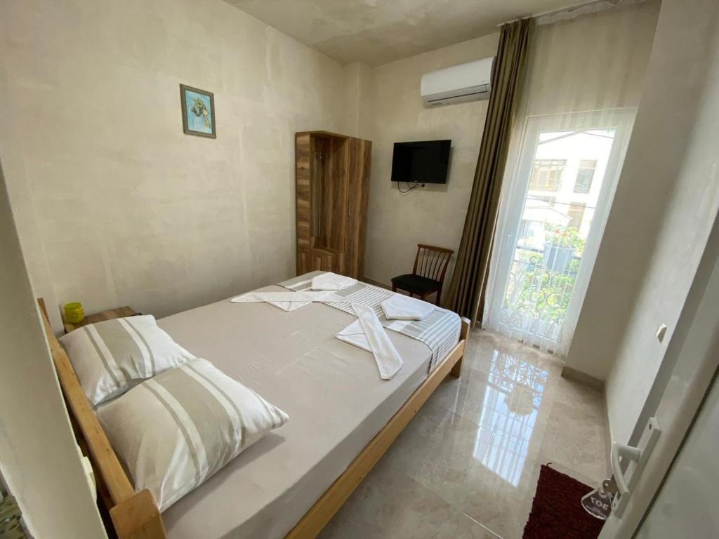 Llit o llits en una habitació de GUEST HOUSE OCEAN FORCE