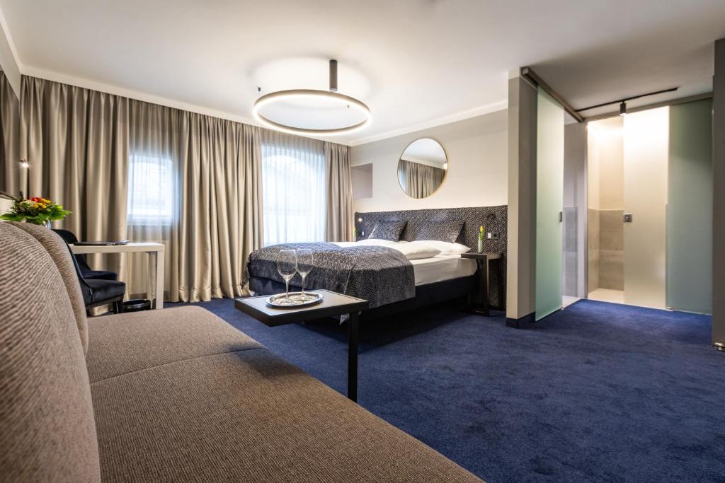 Posteľ alebo postele v izbe v ubytovaní Boutiquehotel am Dom