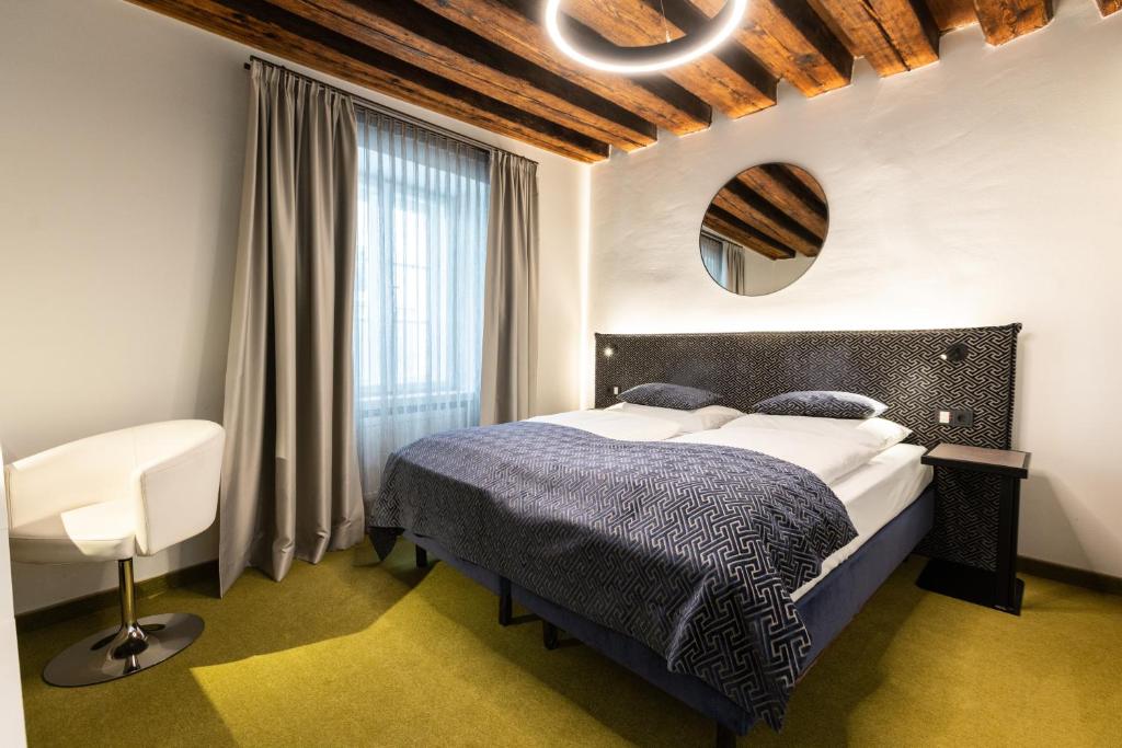 Posteľ alebo postele v izbe v ubytovaní Boutiquehotel am Dom