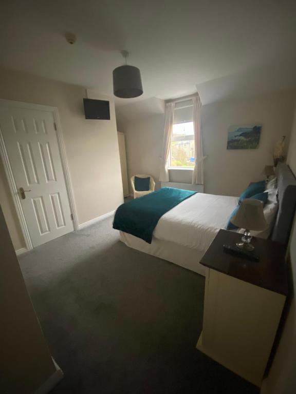 Postel nebo postele na pokoji v ubytování Suantrai Accommodation