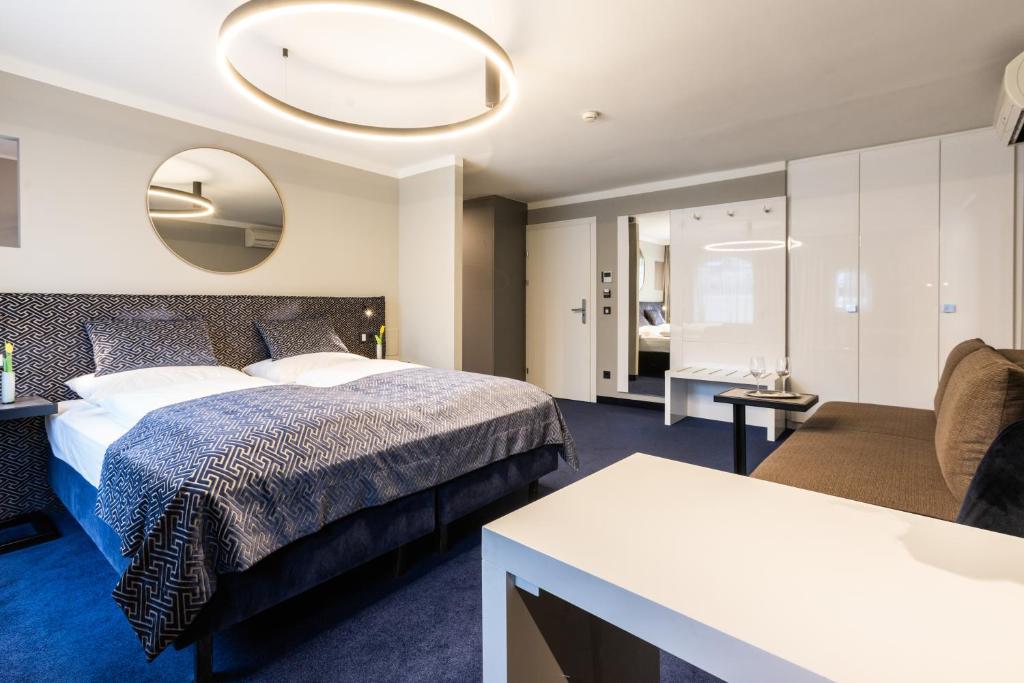 Posteľ alebo postele v izbe v ubytovaní Boutiquehotel am Dom