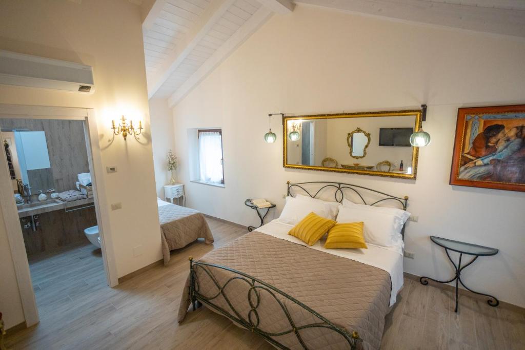 Un pat sau paturi într-o cameră la Il Casolare