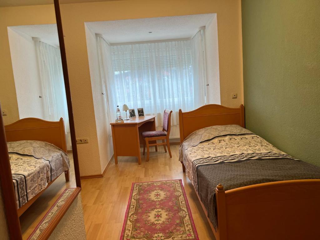Postel nebo postele na pokoji v ubytování Landhaus Pusteblume