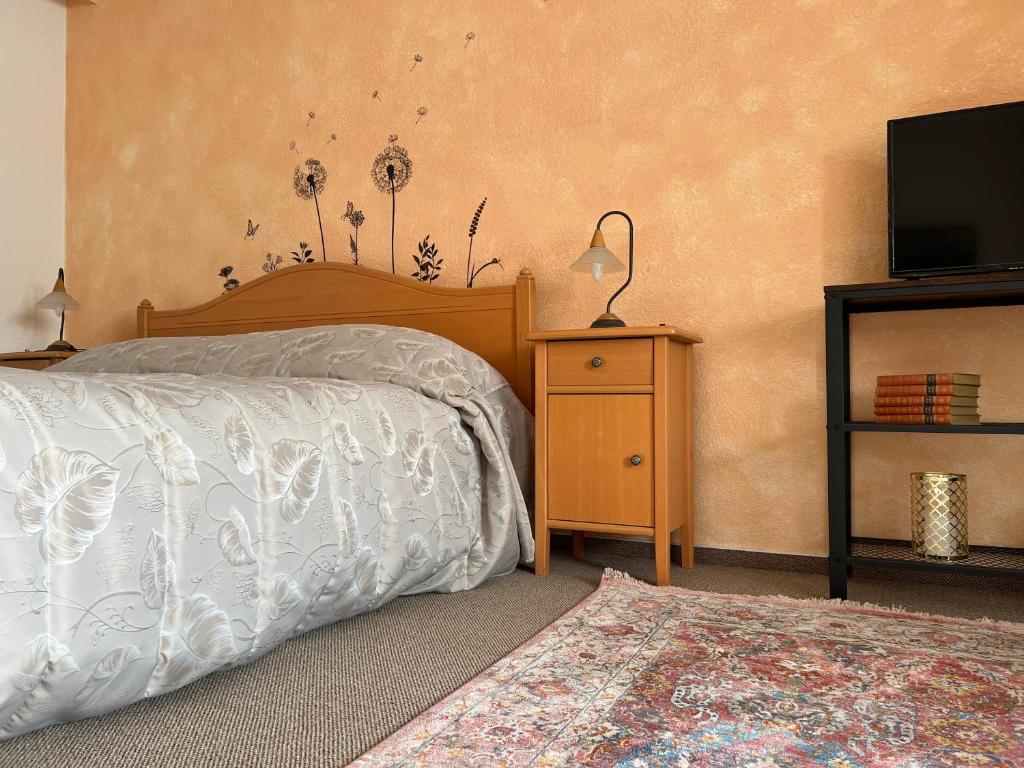 Postel nebo postele na pokoji v ubytování Landhaus Pusteblume