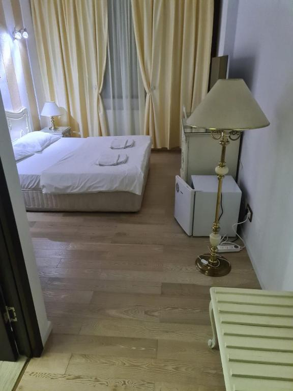 Postel nebo postele na pokoji v ubytování Nevis Fundeni