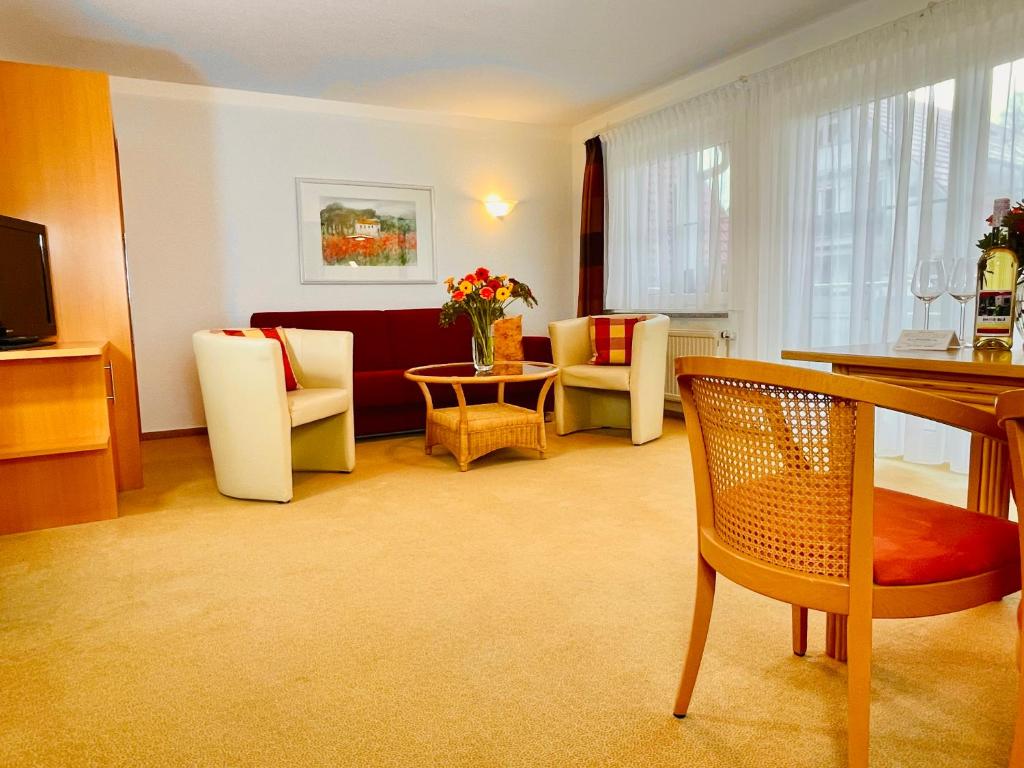 TV a/nebo společenská místnost v ubytování Im Winkel Appartements und Zimmer