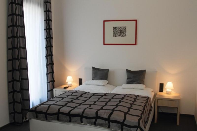 Posteľ alebo postele v izbe v ubytovaní Hotel Arkadia