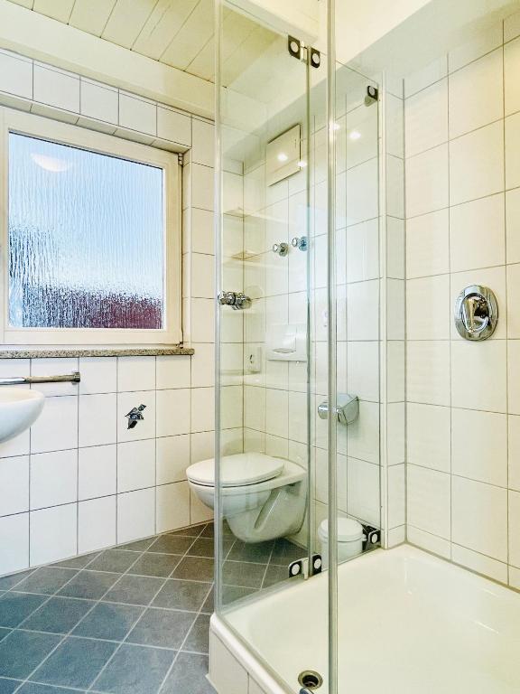 Koupelna v ubytování Im Winkel Appartements und Zimmer