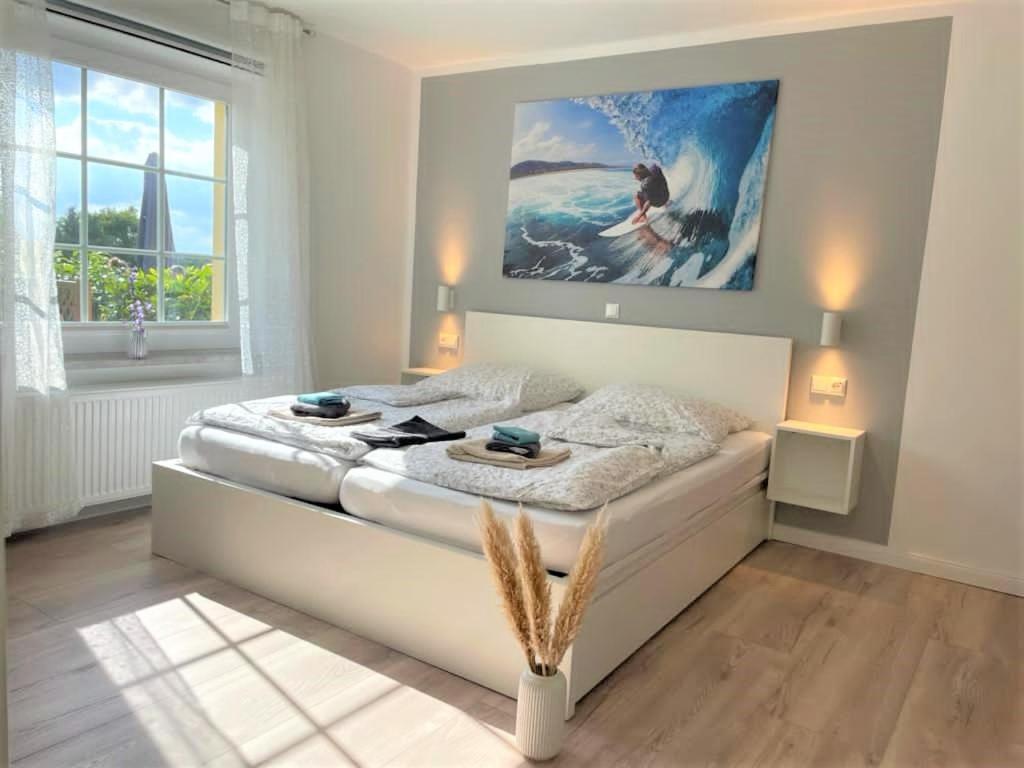 Ένα ή περισσότερα κρεβάτια σε δωμάτιο στο NEU! Appartement Wellenrauschen