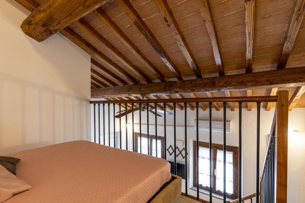 Posteľ alebo postele v izbe v ubytovaní La Loggia Di Giulia