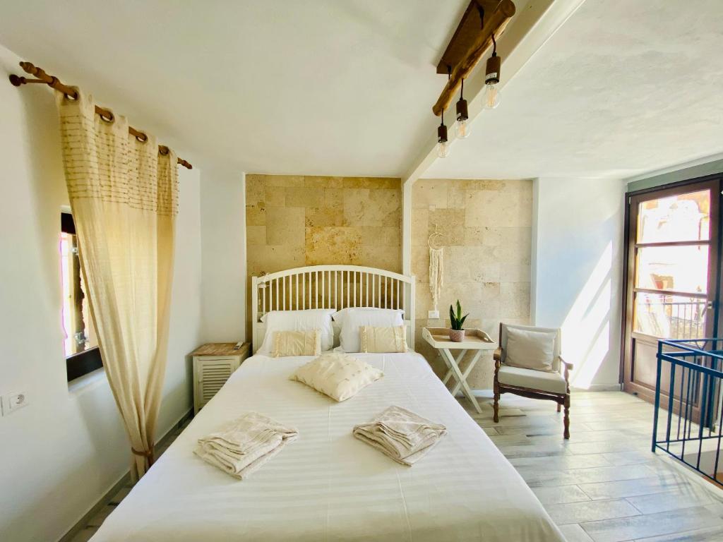 A bed or beds in a room at Nonna Cannella