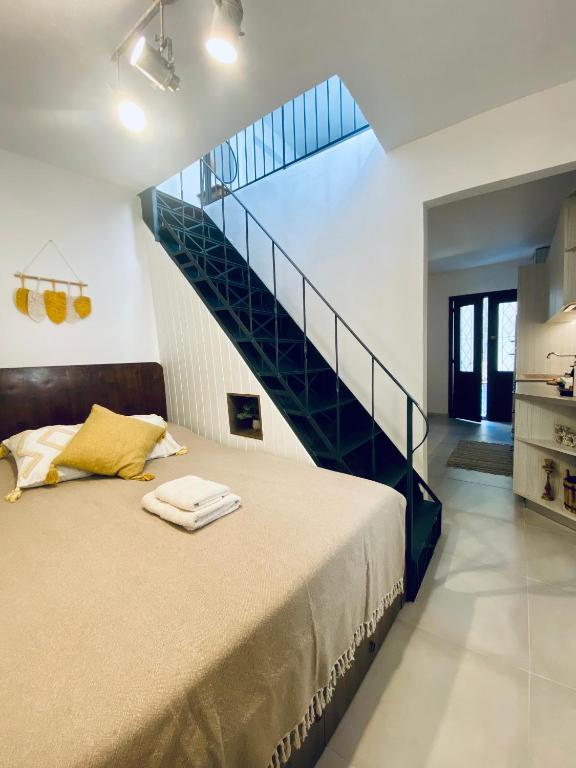 A bed or beds in a room at Nonna Cannella