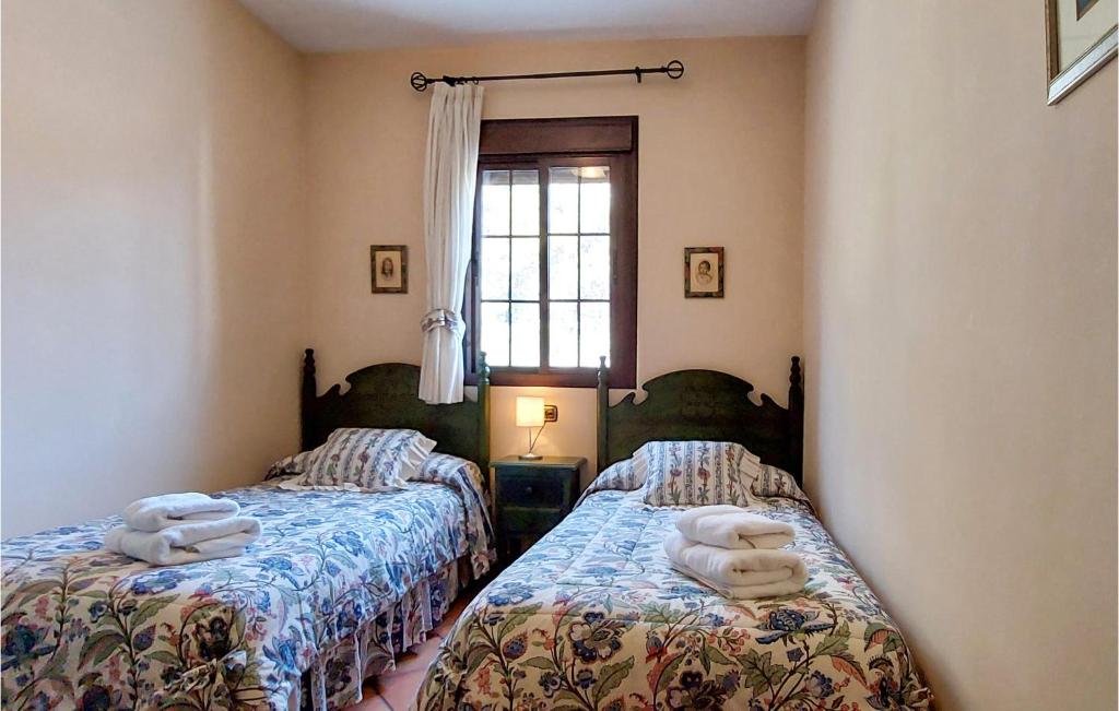 Posteľ alebo postele v izbe v ubytovaní Cozy Home In Grazalema With Wifi