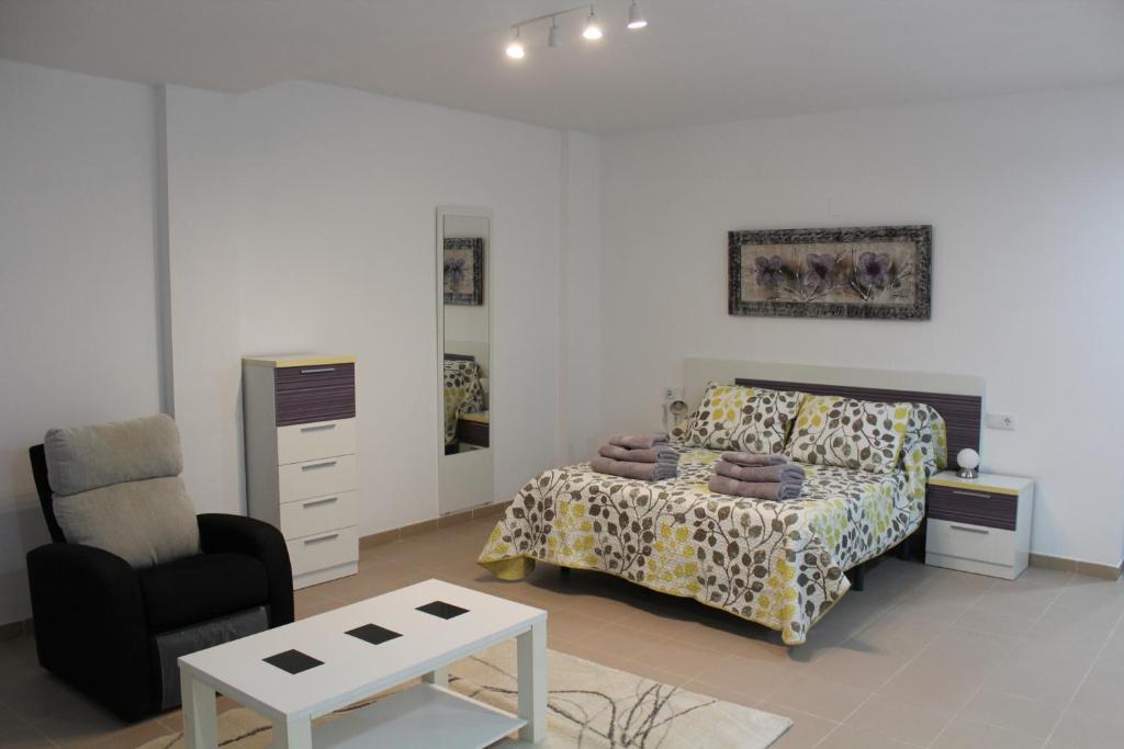 En eller flere senge i et værelse på CALPE-Montesol