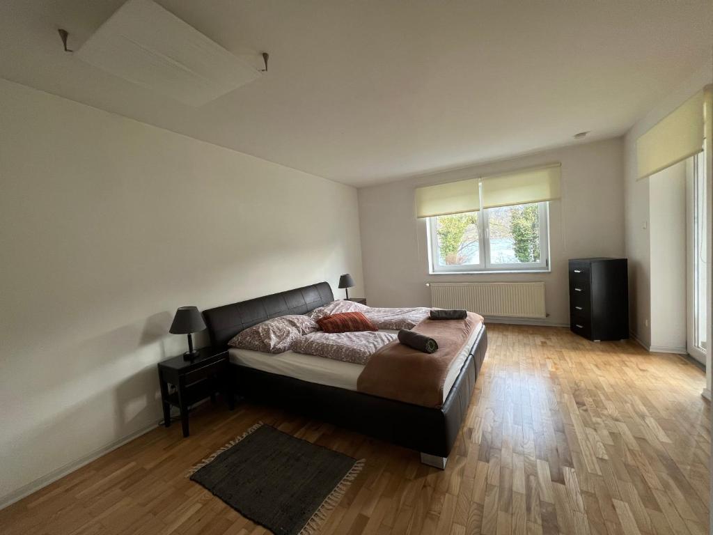 Postel nebo postele na pokoji v ubytování Ferienhaus am See