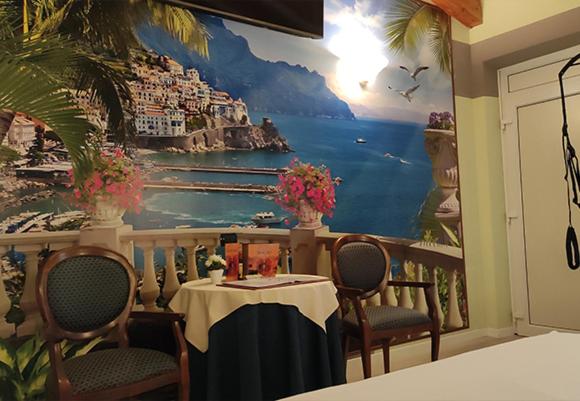 A restaurant or other place to eat at Hotel Don Carlo