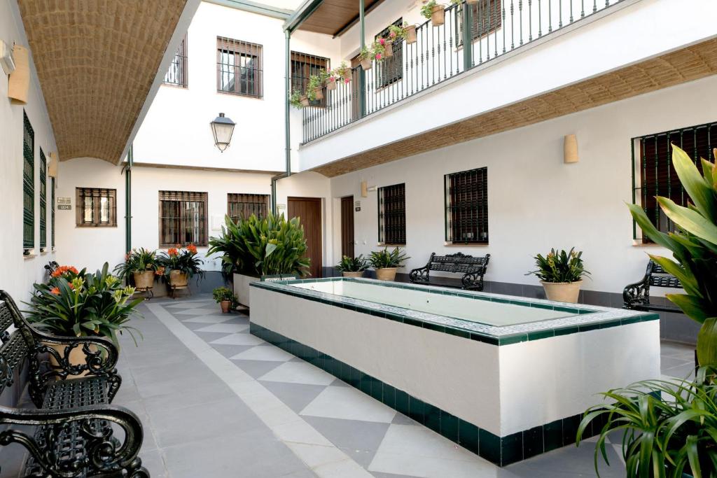 Booking.com: Triana Boutique Apartments by Hommyhome ...