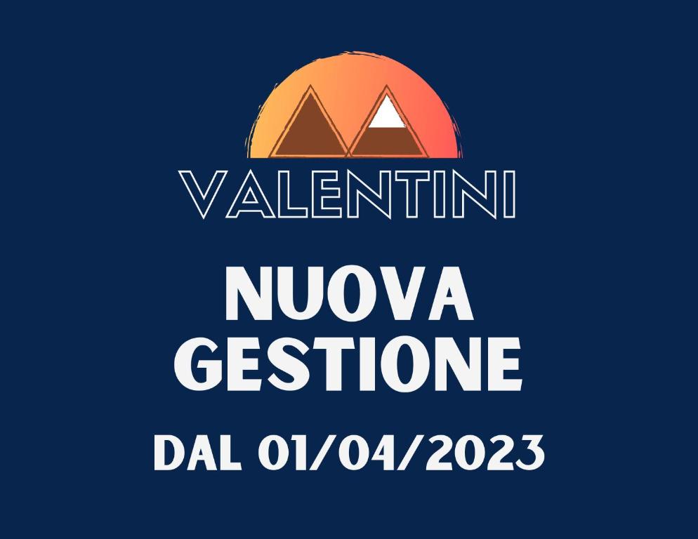 un logotipo para el destino naissance navajo en Albergo Valentini, en Baceno