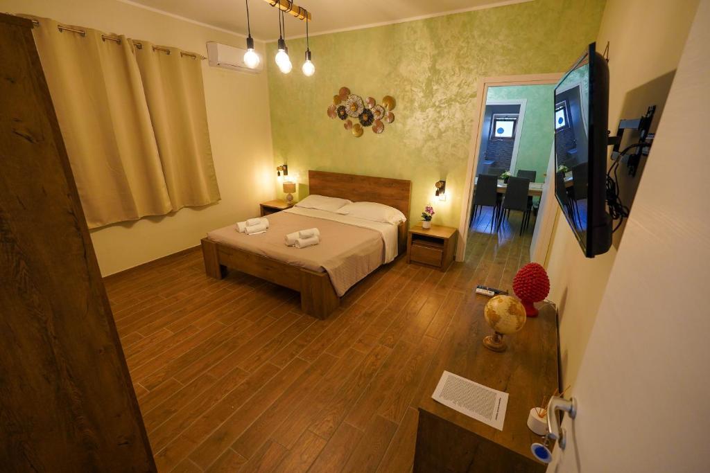 Postel nebo postele na pokoji v ubytování Il Geranio b&b