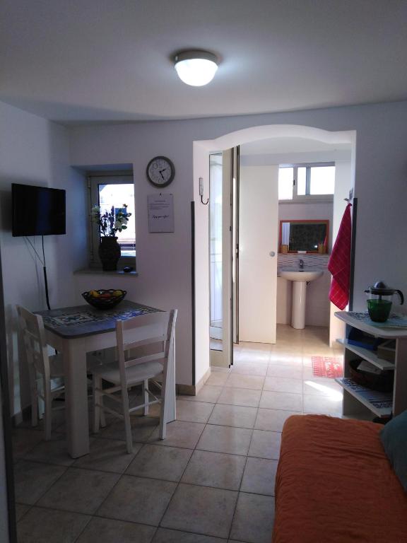 Televízia a/alebo spoločenská miestnosť v ubytovaní Porta Nuove Vacanze