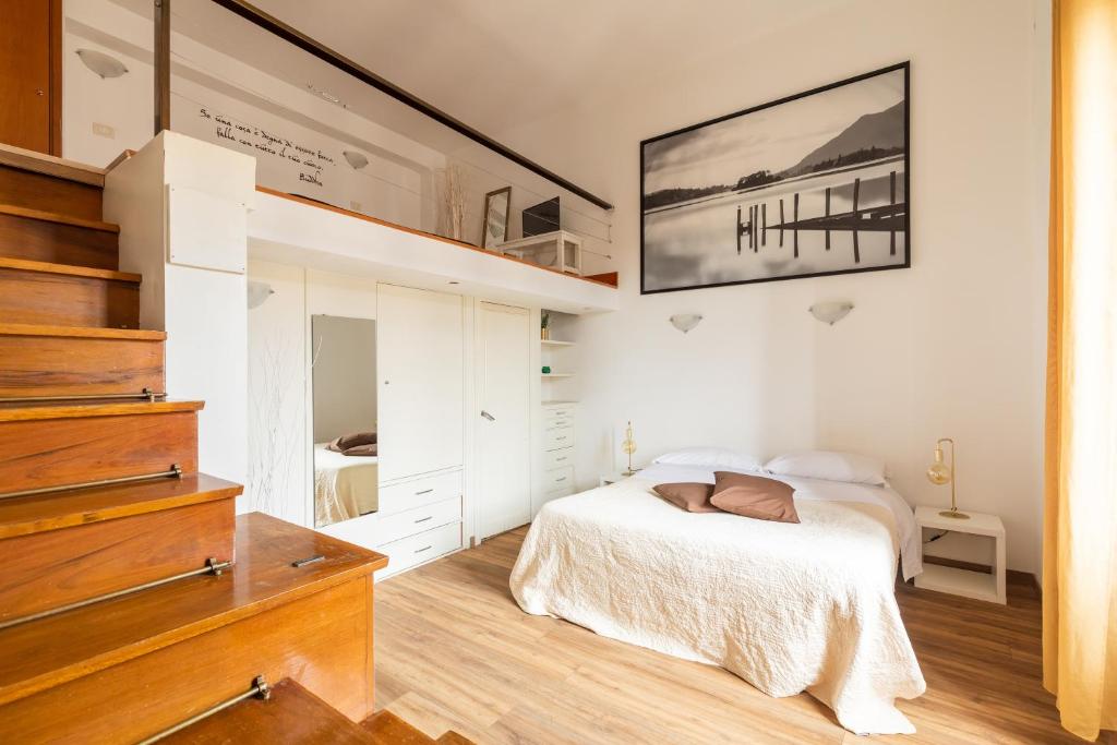 Кровать или кровати в номере Ginevra Suite
