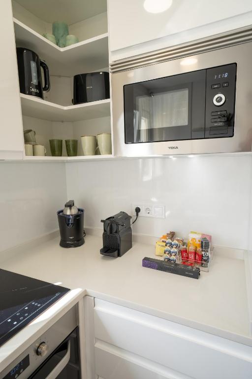 Kuchyňa alebo kuchynka v ubytovaní Your Home In Malaga Centro & Parking free