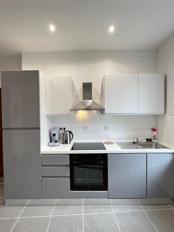 Η κουζίνα ή μικρή κουζίνα στο Appartement de la laverie