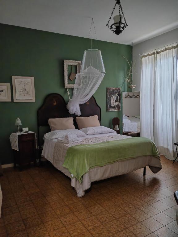 A bed or beds in a room at B&B LaMaGia di Corte Moronati
