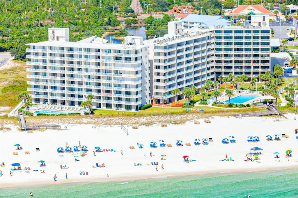 an aerial view of a beach in front of a hotel at Seaside Beach and Racquet Club Condos II in Orange Beach