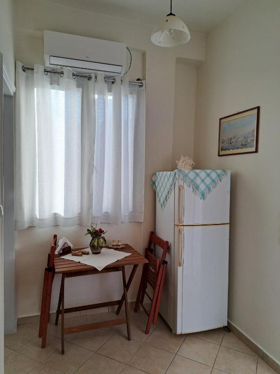 Kuchyň nebo kuchyňský kout v ubytování Persefoni's Room