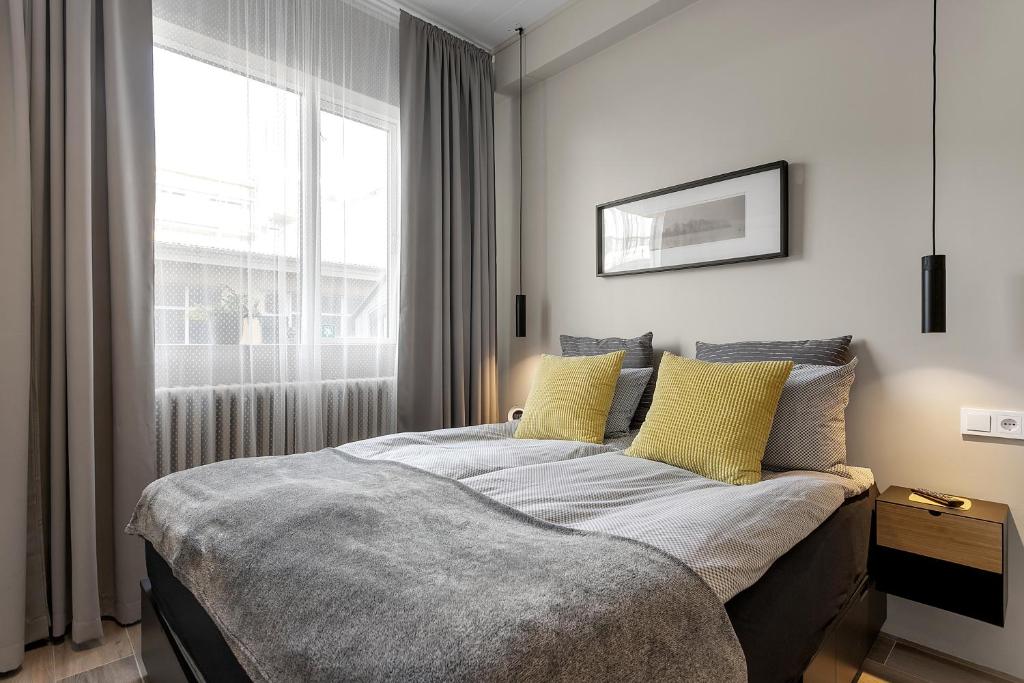 Postel nebo postele na pokoji v ubytování NN Urban Guesthouse