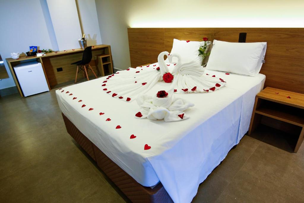 Postel nebo postele na pokoji v ubytování NEO PARK HOTEL