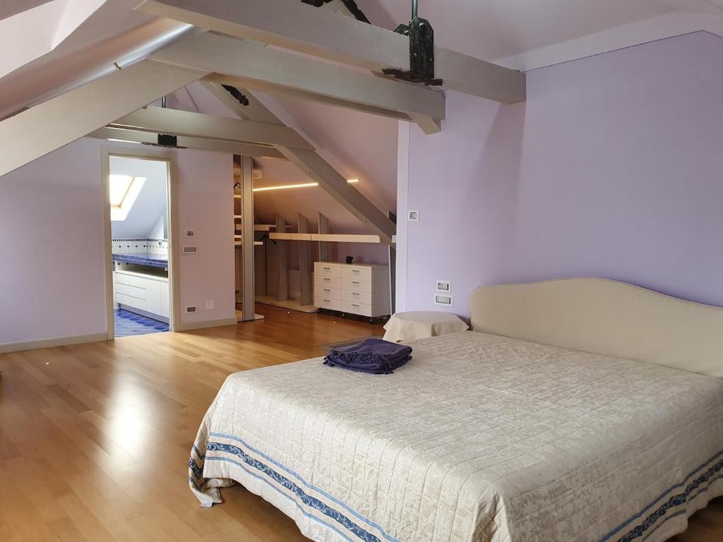 Łóżko lub łóżka w pokoju w obiekcie Villa Rita