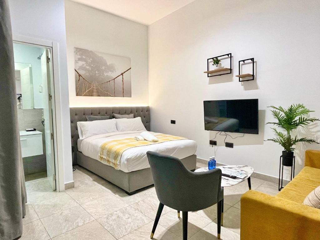 Posteľ alebo postele v izbe v ubytovaní Tennessee Urban Suites